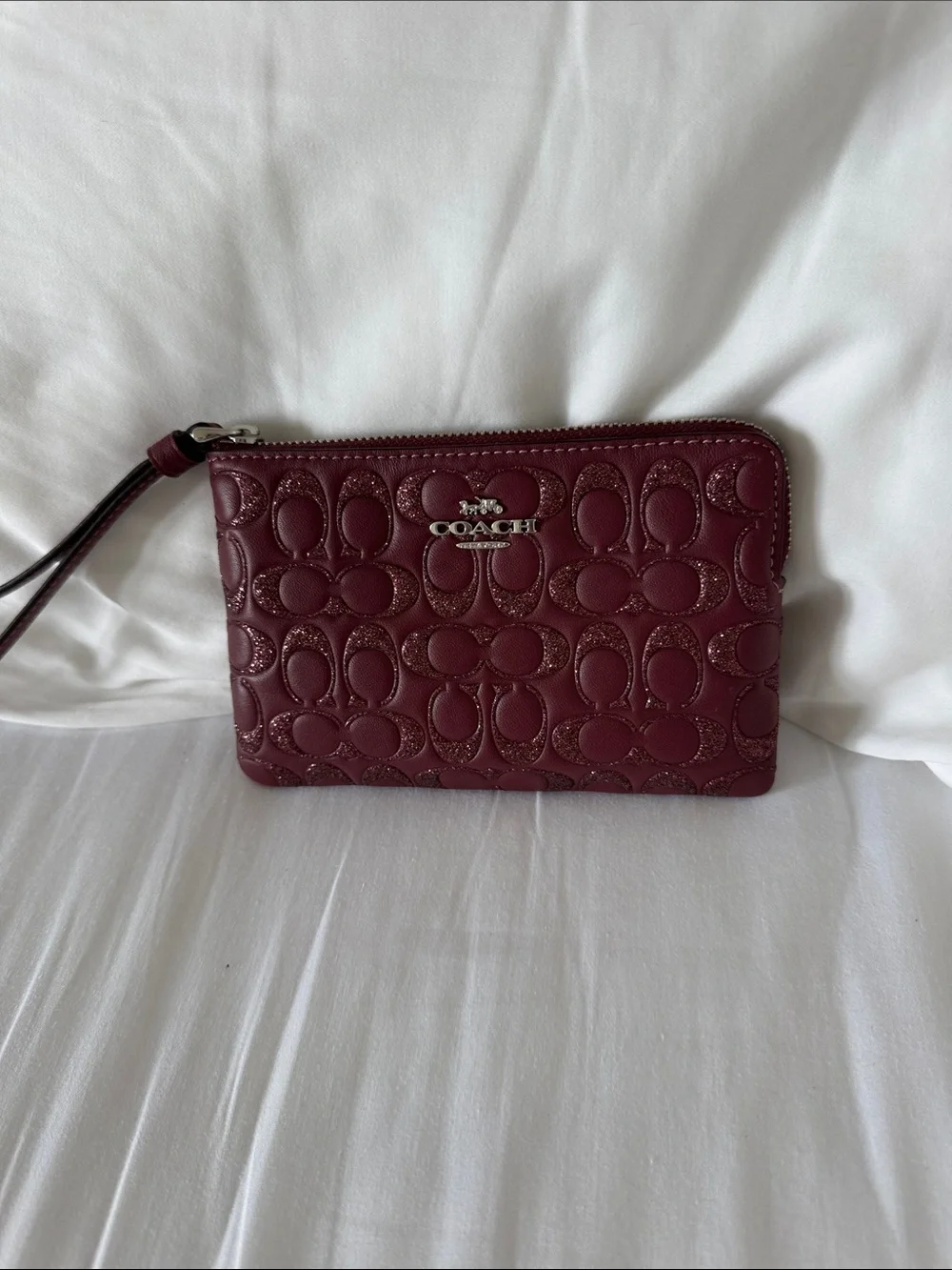 Coach glitter signature logo corner zip wristlet wine color NWT